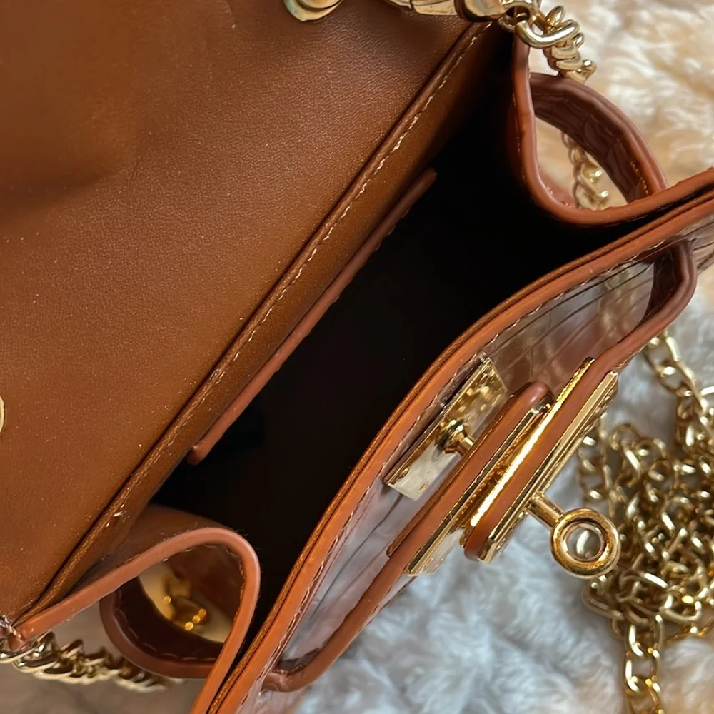 🎉 HP🎉 It’s just too Cute! Her lil purse chain or handle. Cognac FASHION NOVA NEW
